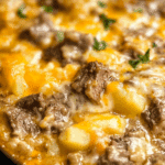 Slow Cooker Steak and Cheddar Potato Casserole